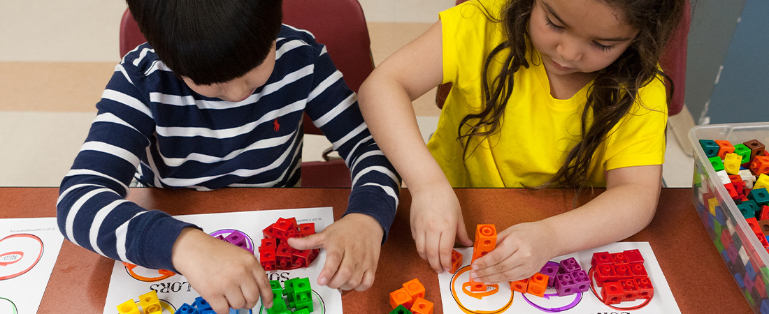 A photo of children using blocks representing New EDC Study to Advance Knowledge of Children’s Math and Spatial Learning