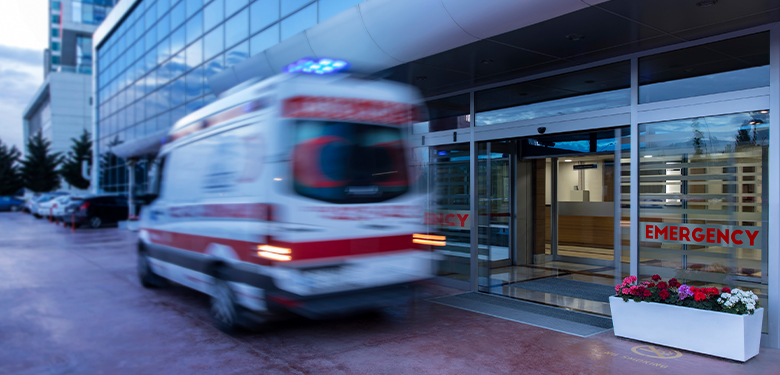 Ambulance in front of a hospital