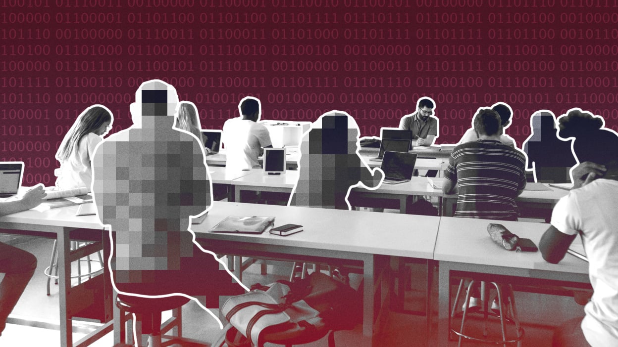 Pixelated image of students' backs facing computers at long tables.