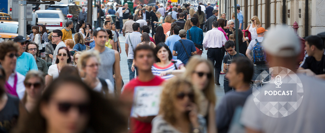 A photo of a busy street with many pedestrians