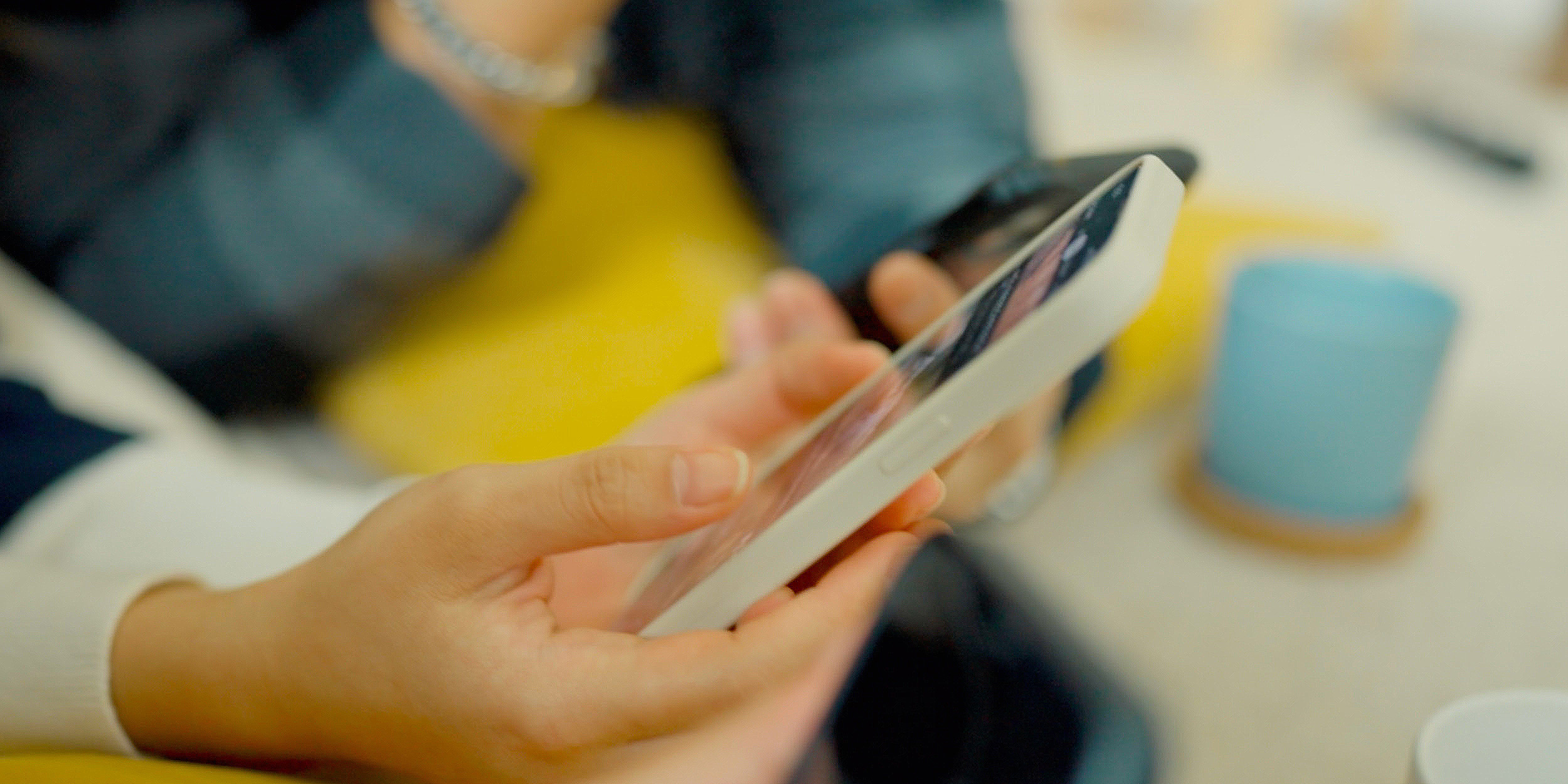 A youth using a phone representing EDC to Launch Digital Wellness Initiative