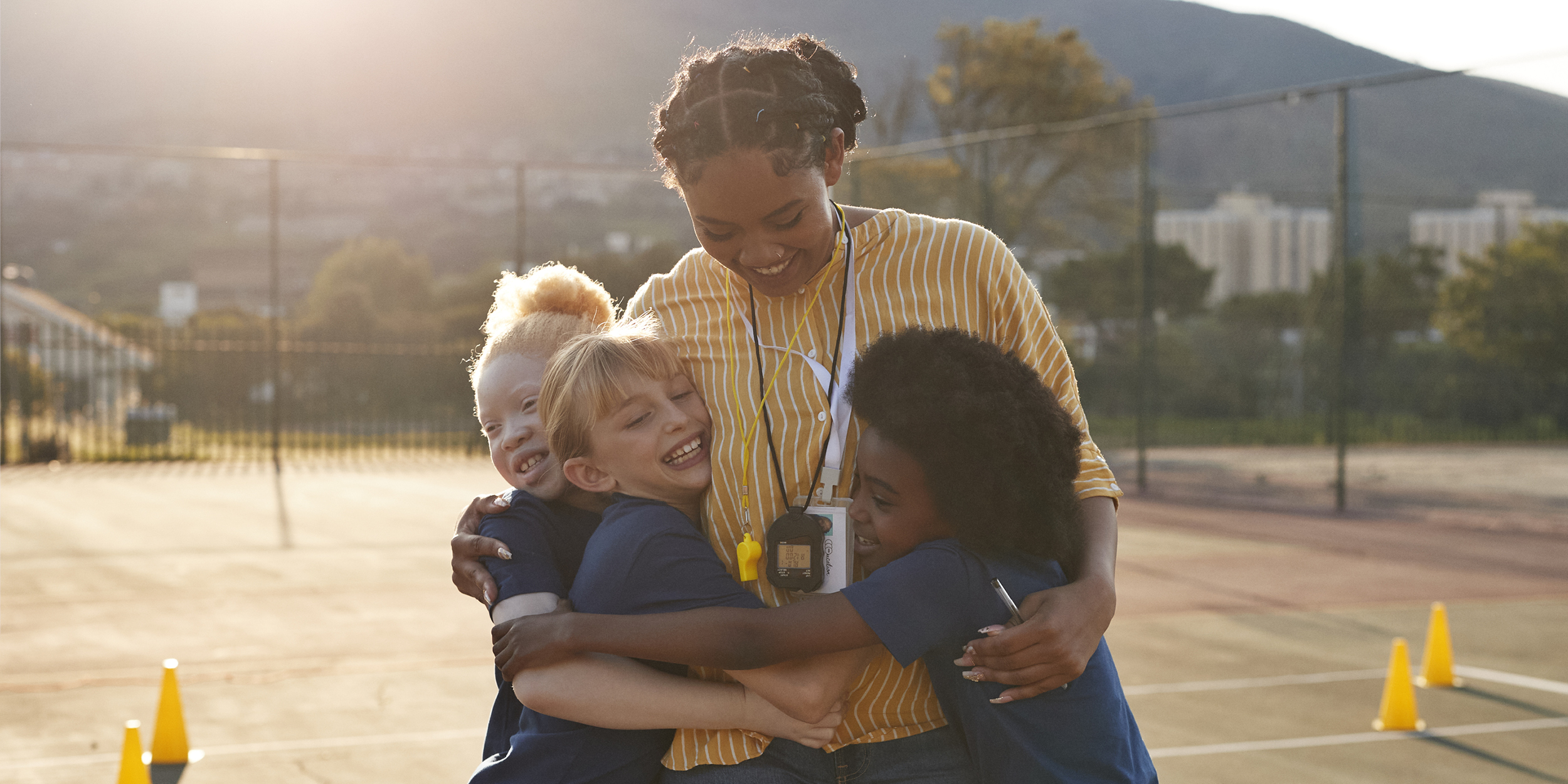 A photo of student and teacher representing Assessing and Addressing School Needs in Suicide Prevention