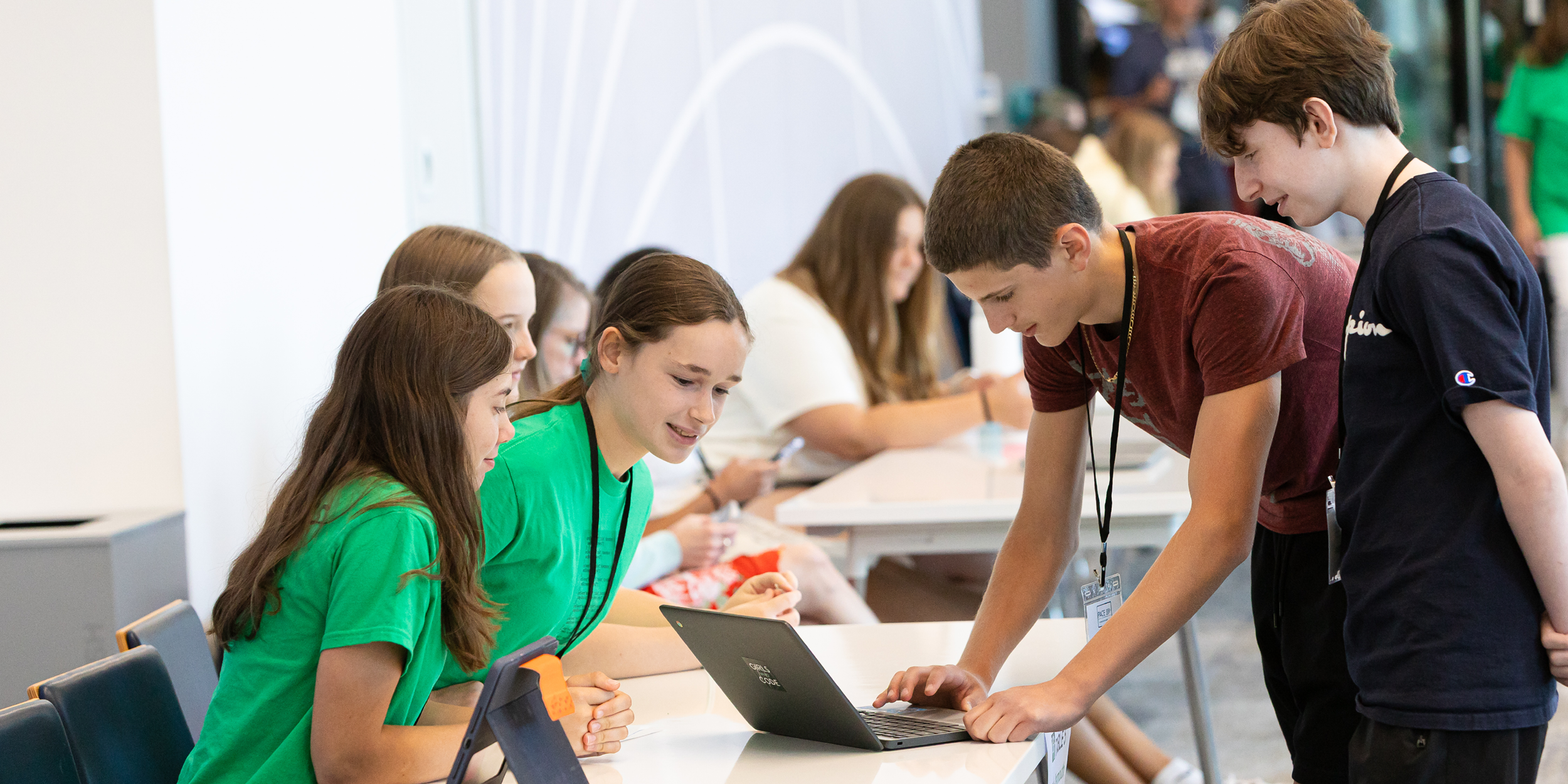 A photo of students using computers representing Lessons from PACE: Part 1 – Building Sustainable Computer Science Programs