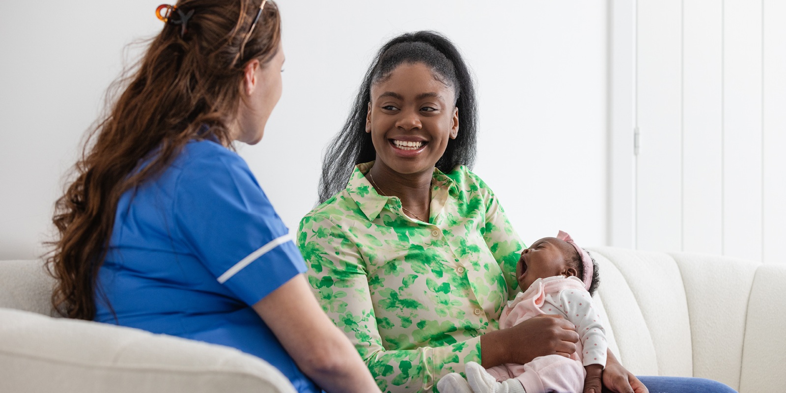 Photo of mother and home visitor representing The Power and Potential of Home Visiting
